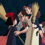 Studio Ghibli Coming-of-Age Movies: Best Watches About Growing Up Kiki flying over town in an official Studio Ghibli still from Kiki’s Delivery Service