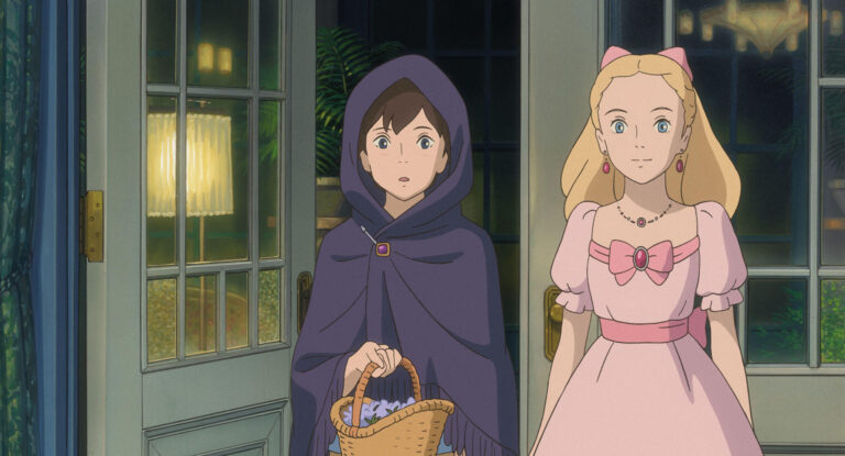 Anna and Marnie standing together in a doorway in When Marnie Was There