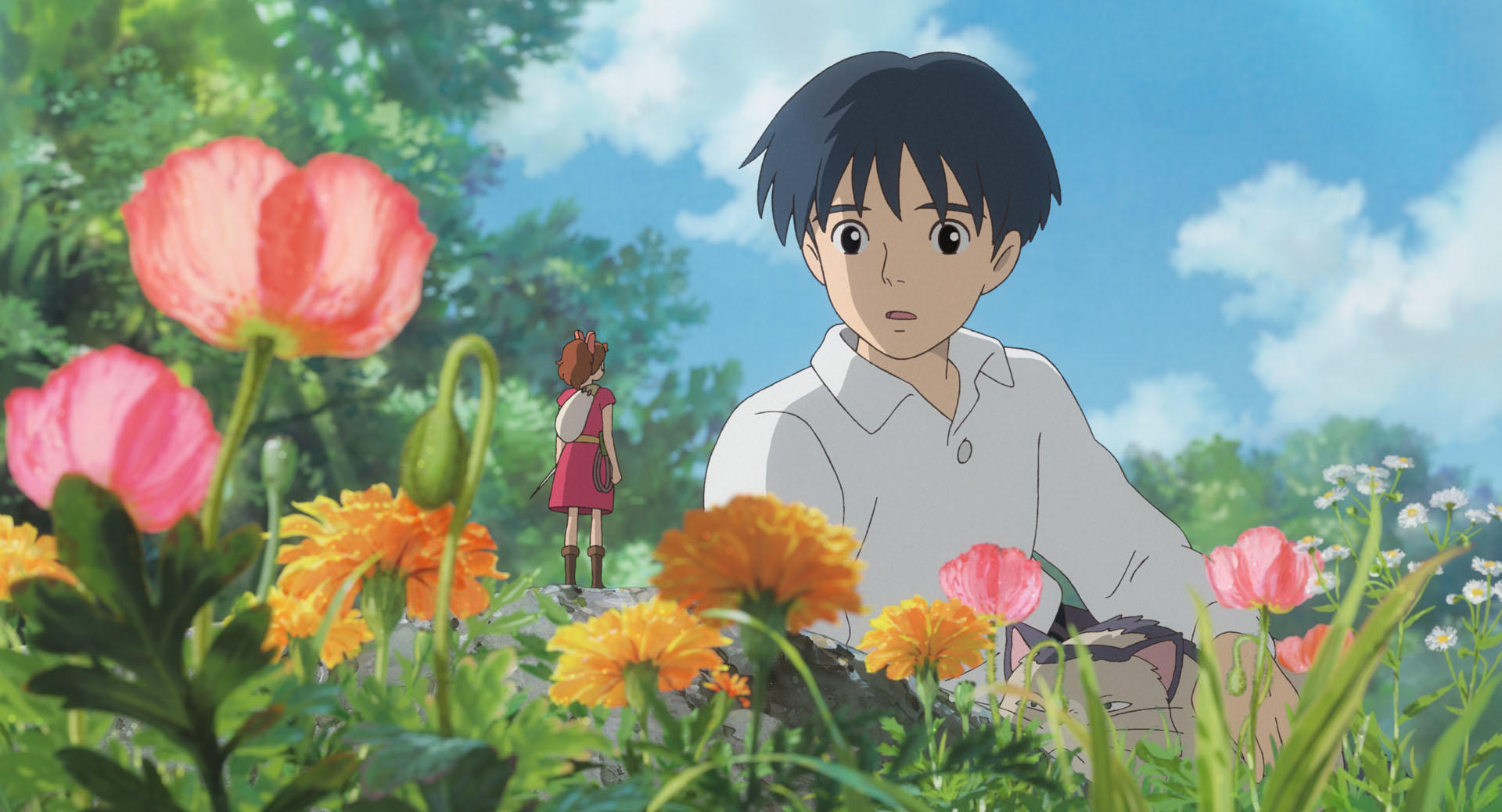 Arrietty standing among tall flowers in an official film still
