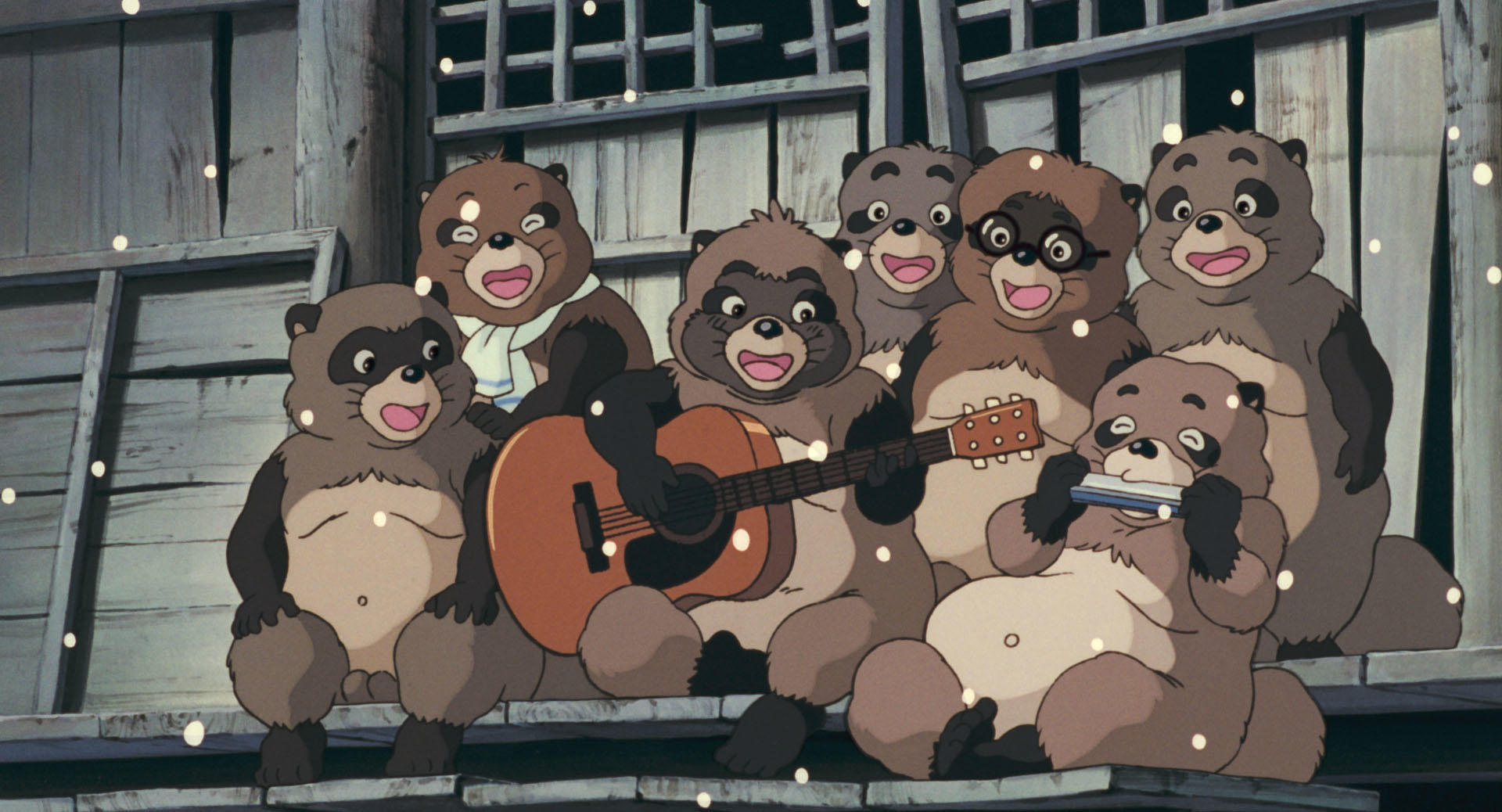 Tanuki play music together during a lively scene in Pom Poko